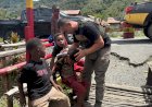 Satgas Tindak Operasi Damai Cartenz 2025  Cukur Rambut Gratis Anak-anak di Distrik Mulia Puncak Jaya