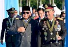 Kapolri dan Presiden Kenakan Tanda Kehormatan Bintang Bhayangkara Utama Saat Pimpin Upacara HUT Bhayangkara ke-79