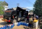 Polri Salurkan Air Bersih dan Bagikan Masker untuk Warga Terdampak Banjir di Nagan Raya