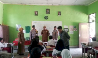 Pastikan Program Berjalan Lancar, Polsek Jatisampurna Monitoring Penyaluran Makan Bergizi Gratis di SDN II
